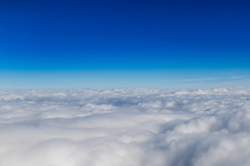 Blue horizon and white clouds, aerial shot