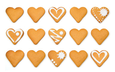 Heart shaped cookies pile isolated over white