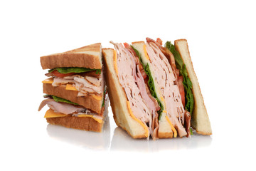 sliced chicken club sandwich - 102429082