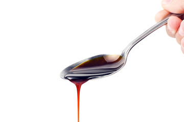 A Spoon of Soya Ketchup on White Background © badeleven