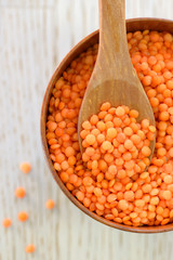 Red lentils in spoon