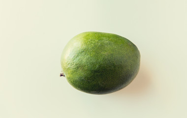 ripe green mango over white