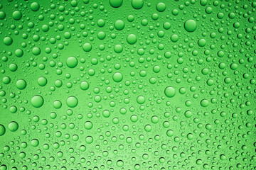 Fototapeta na wymiar Green water drops background.
