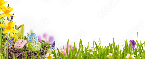 Decorated Easter eggs in a spring meadow