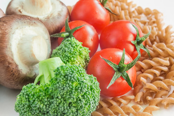 Raw pasta and vegetables.