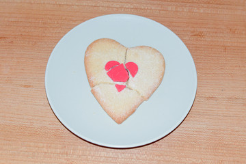 Fototapeta na wymiar Broken Love heart cookie