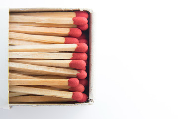 Macro of matches isolated on white background with copy space.