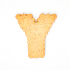 letter Y made of cracker cookie isolated on white background.