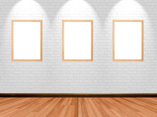 Empty frames on room background with wooden floor brick wall and spotlight.