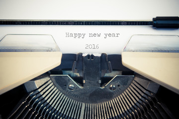typewriter with white paper. Happy new year 2016 sign