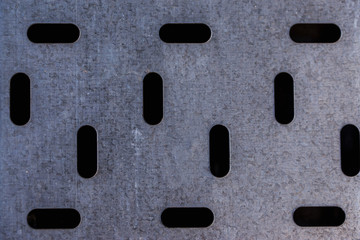 Metal background with holes