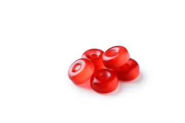 Red candies isolated on white
