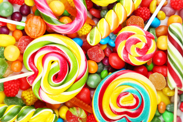 Fototapeta na wymiar Different fruit candies background