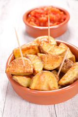 roasted potatoes and spicy tomato sauce
