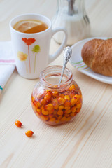 Sea buckthorn jam in a jar. Tasty and healthy.