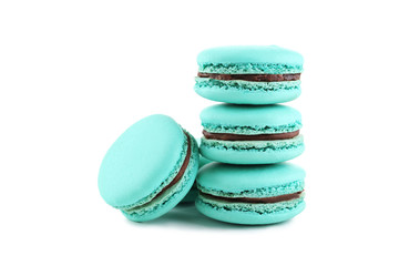 Tasty blue macarons isolated on white