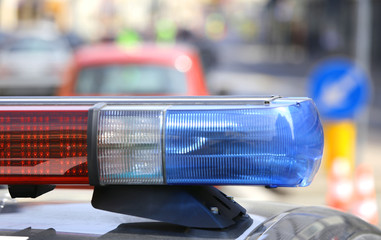 flashing police car during a roadblock