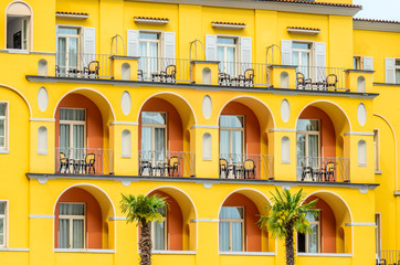 Windows decorated with flowers in italy.