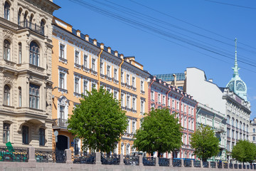 The Moyka River Embankment with residential and business structures in Saint Petersburg