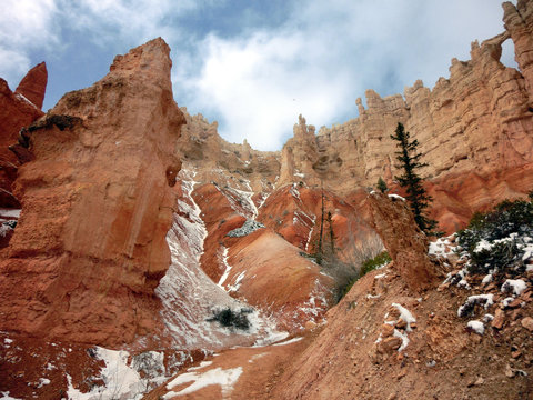 Beautiful rock formations in Bryce Canyon National Park with snow - landscape color photo