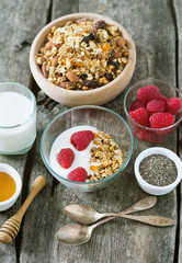 healthy snack - granola on wooden surface