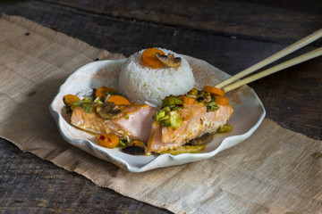 Chinese style salmon with pok choi, carrots and mushrooms