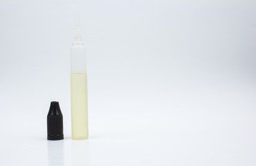 Tall bottle of EJuice isolated on white background