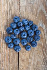 blueberries on a wooden background