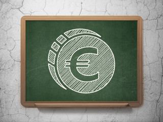Banking concept: Euro Coin on chalkboard background