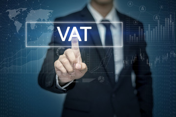 Obraz premium Businessman hand touching VAT button on virtual screen