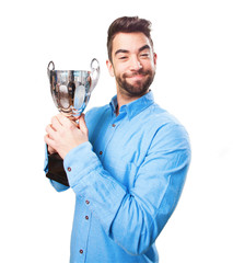 cool man holding a trophy