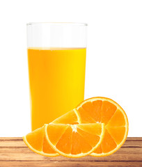 orange juice in the glass and orange slices on table isolated on