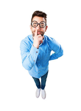 nerd man with finger inside nose