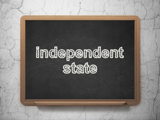 Politics concept: Independent State on chalkboard background