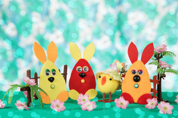 Three Easter bunny and chicken.