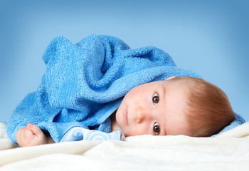 Cute baby in a towel