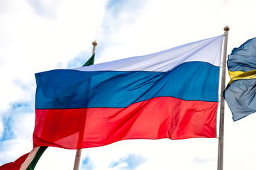 Russian flag, growing in the wind