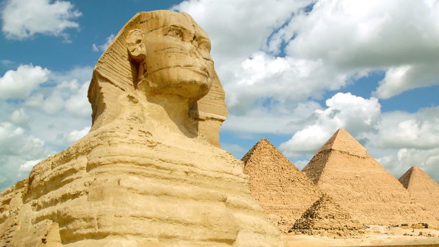 Timelapse of the famous Sphinx with great pyramids in Giza valley, Cairo, Egypt