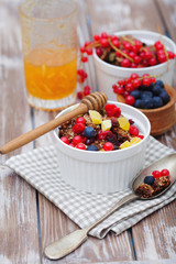 Healthy breakfast with granola and fresh berries