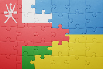 puzzle with the national flag of ukraine and oman