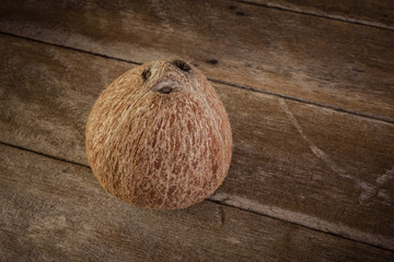 fresh coconuts on old wooden