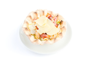 Salad with cheese, bacon and lettuce in dough basket