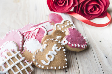 Festive cookies with hearts and roses for Valentine's Day.