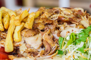 Greek gyros, meat, fried potatoes, tomatoes and onions, Athens Greece, national food, traditional Greek cuisine
