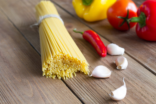 Italian spaghetti, tomatoes, sweet pepper, hot pepper and garlic
