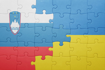 puzzle with the national flag of ukraine and slovenia