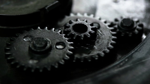 Plastic Gears rotate on a Perfect Loop inside a mechanism.