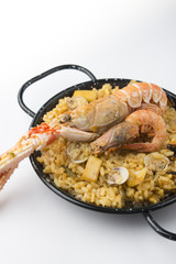 traditional spanish rice - paella isolated on white background