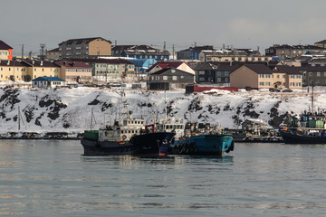 refueling fishing vessels at the roadstead of the city of Yuzhno-Sakhalinsk in Russia
