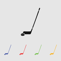 Hockey sticks and puck sport icon